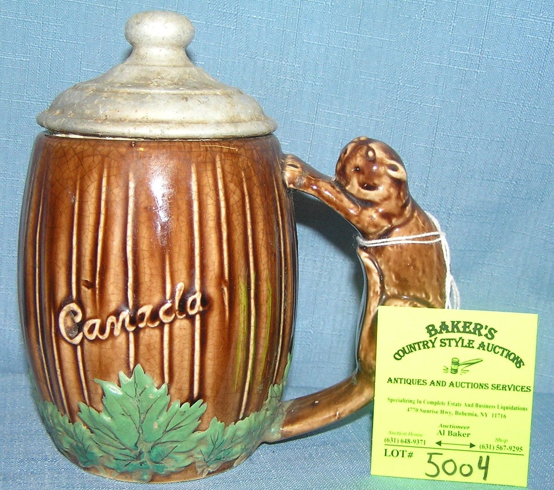 Early Canadian decorated beer mug: Early Canadian decorated beer mug with beaver figural handle $75.00-$100.00