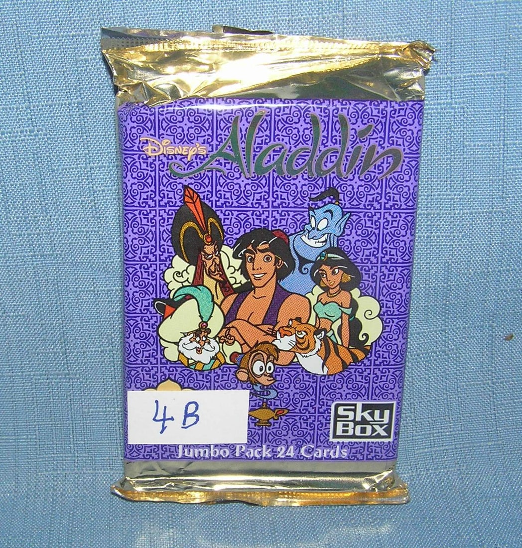 Disney's Aladdin unopened wax pack of collector cards: Disney's Aladdin unopened wax pack of collector cards est. value $15.00-$25.00