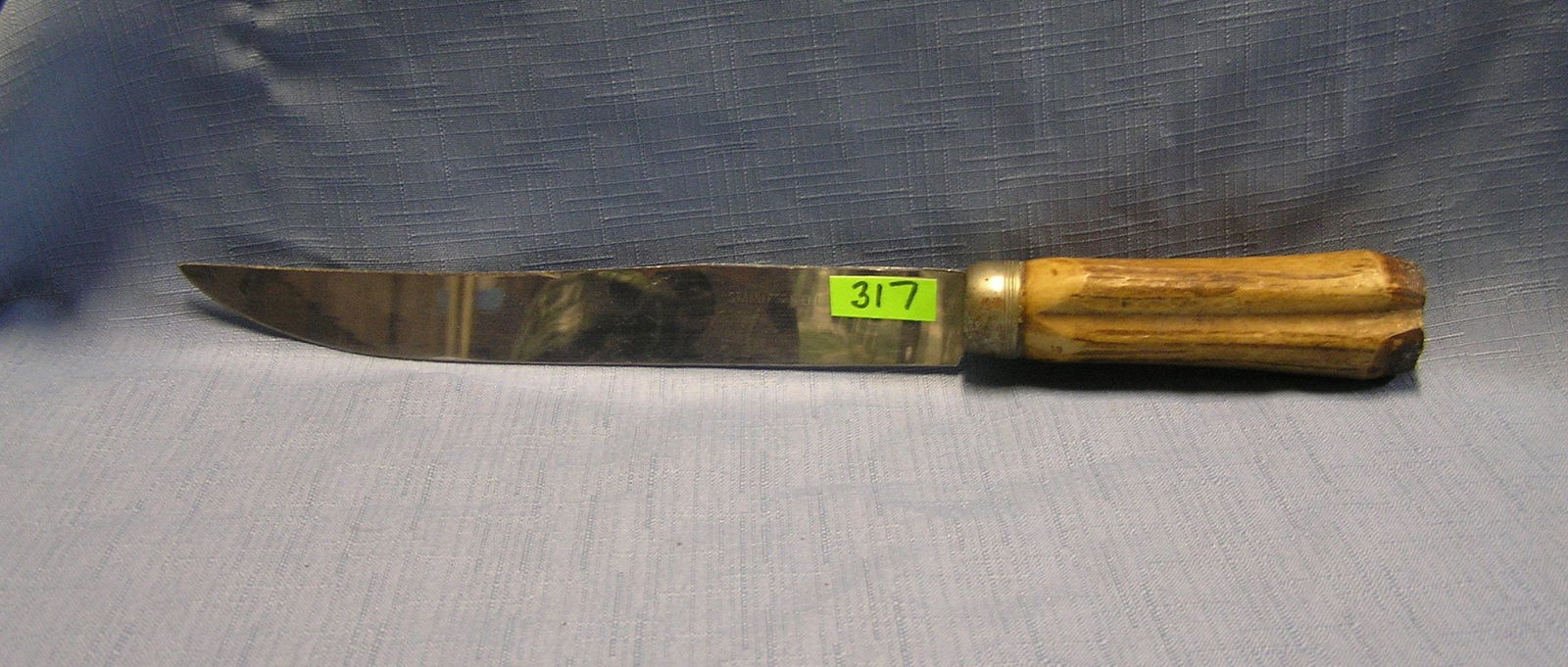 Bone handled carving knife: Bone handled carving knife est. value $75.00-$80.00
