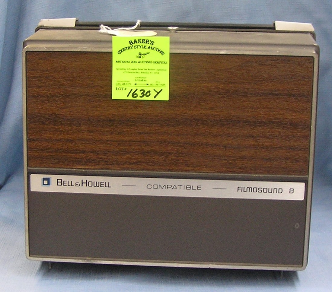 Bell and Howell 8mm film sound projector: Vintage Bell and Howell 8mm film sound projector est. value $150.00-$220.00