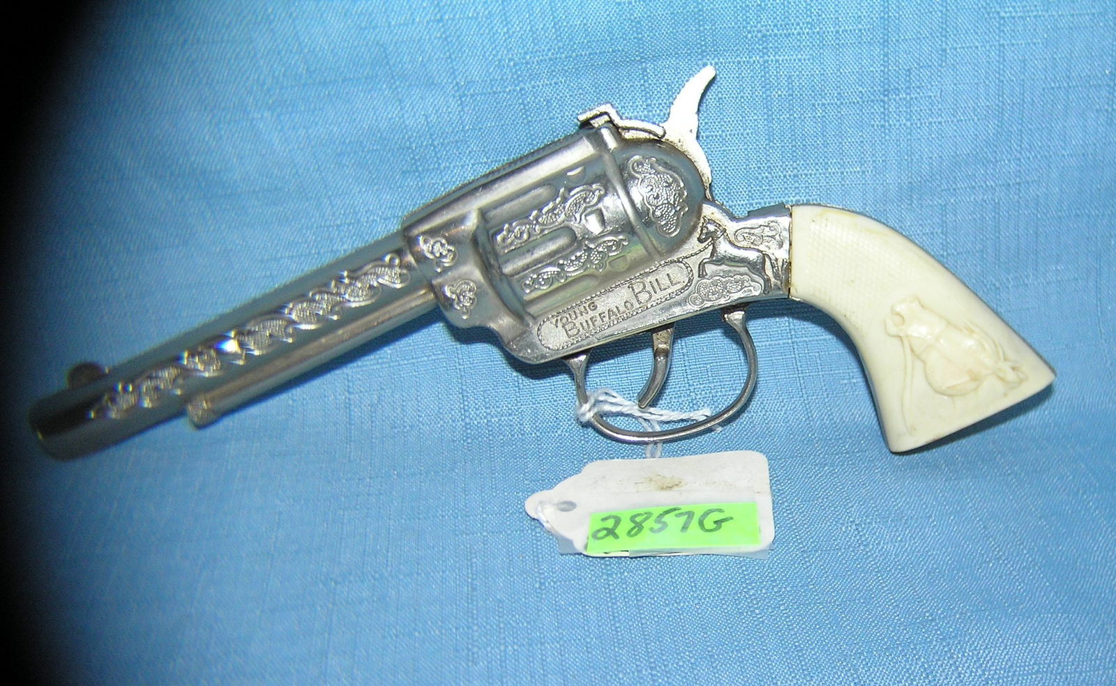 Vintage Buffalo Bill cast metal cap gun: Vintage Buffalo Bill cast metal cap gun est. value $80.00-$100.00