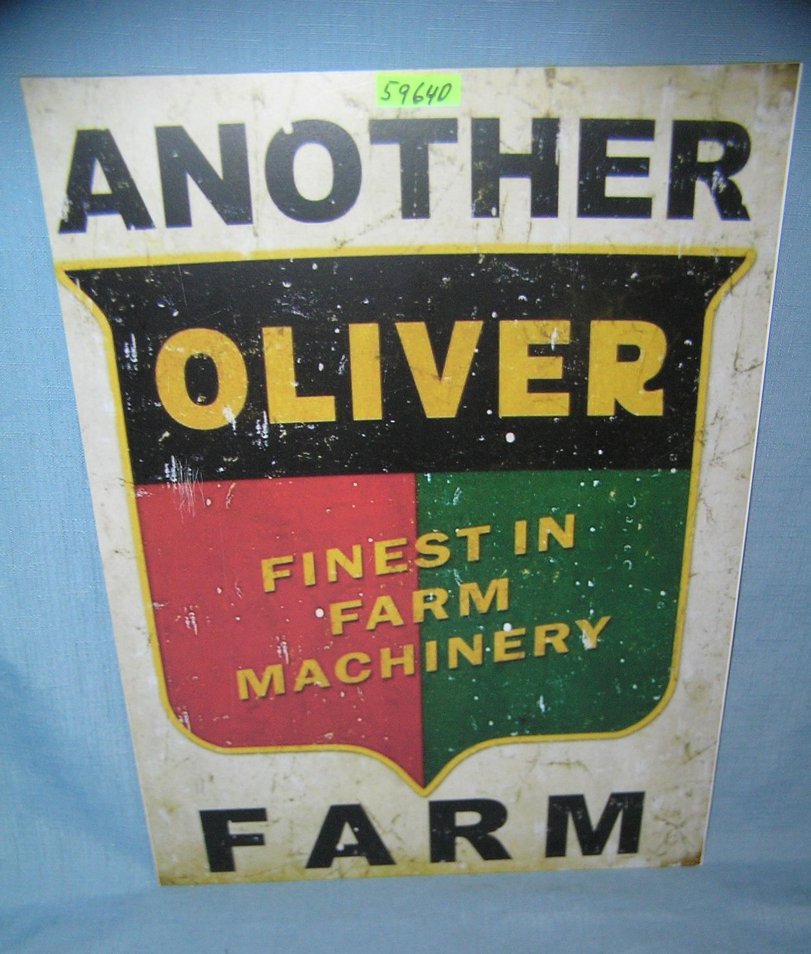 Oliver finest in farm equipment retro style advertising sign: Oliver finest in farm equipment retro style advertising sign est. value $50.00-$65.00