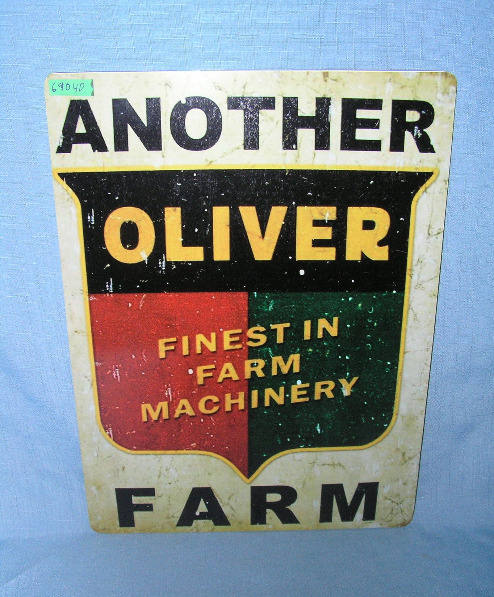 Another Oliver Finest in Farm Machinery retro retro style advertising sign: Another Oliver Finest in Farm Machinery retro retro style advertising sign printed on PVC hardboard these signs are auctioned for their decorative and display purposes 12 inches by 16 inches est. valu