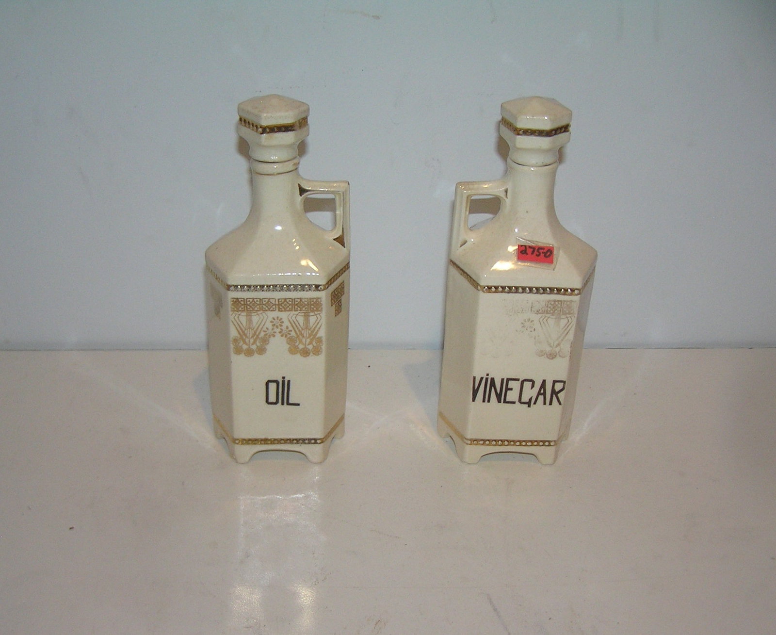 Pair of Austrian oil and vinegar decanters: Pair of Austrian oil and vinegar decanters signed on base Louise Austria circa 1920's est. value $100.00-$150.00