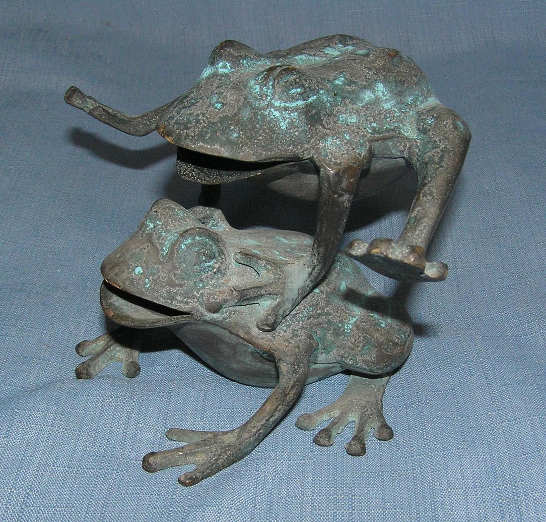 Bronze leap frog figure: Bronze leap frog figure great for indoor or outdoor display features 2 frogs with 1 frog leaping over the other est. value $175.00-$200.00