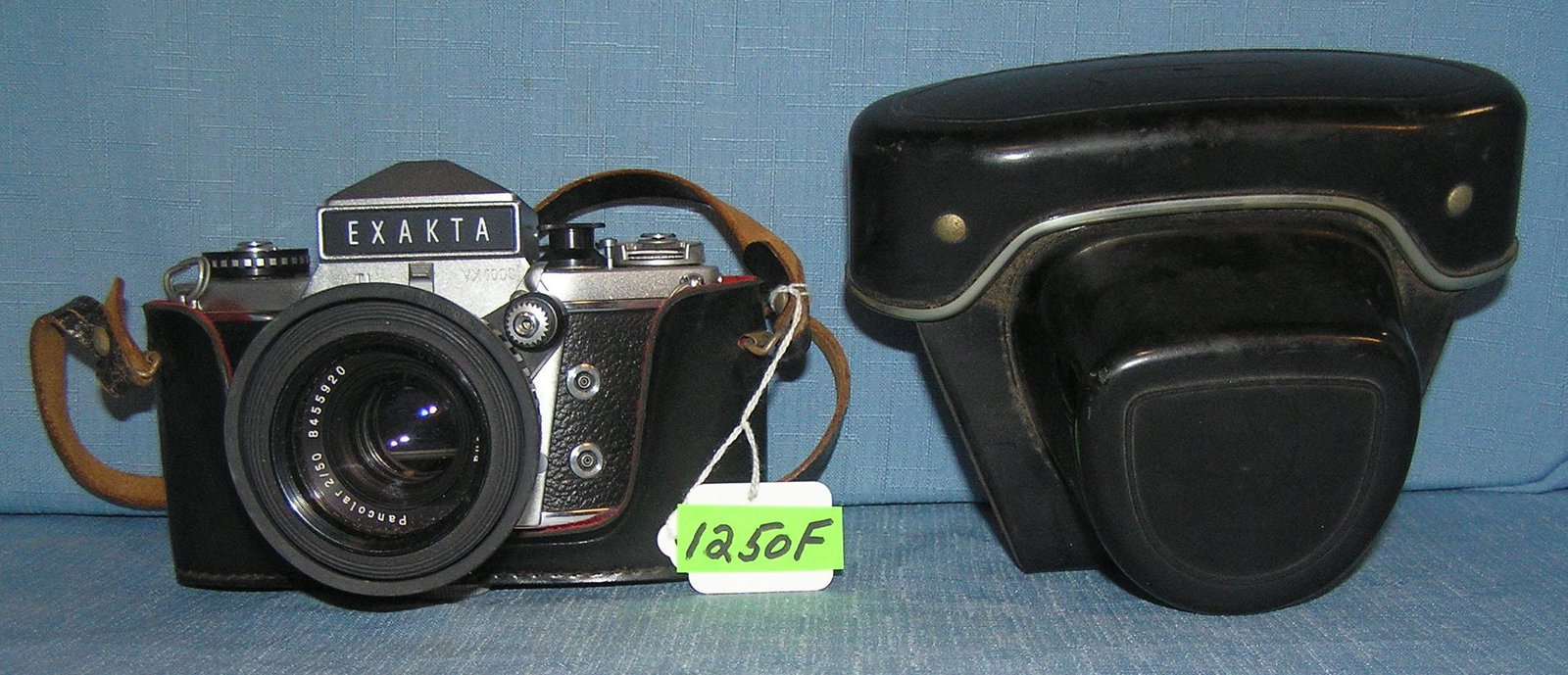 Exakta professional model 35MM camera: Exakta high quality professional model 35MM camera with Carl Zeiss lens made in Germany with original leather case est. value $250.00-$300.00