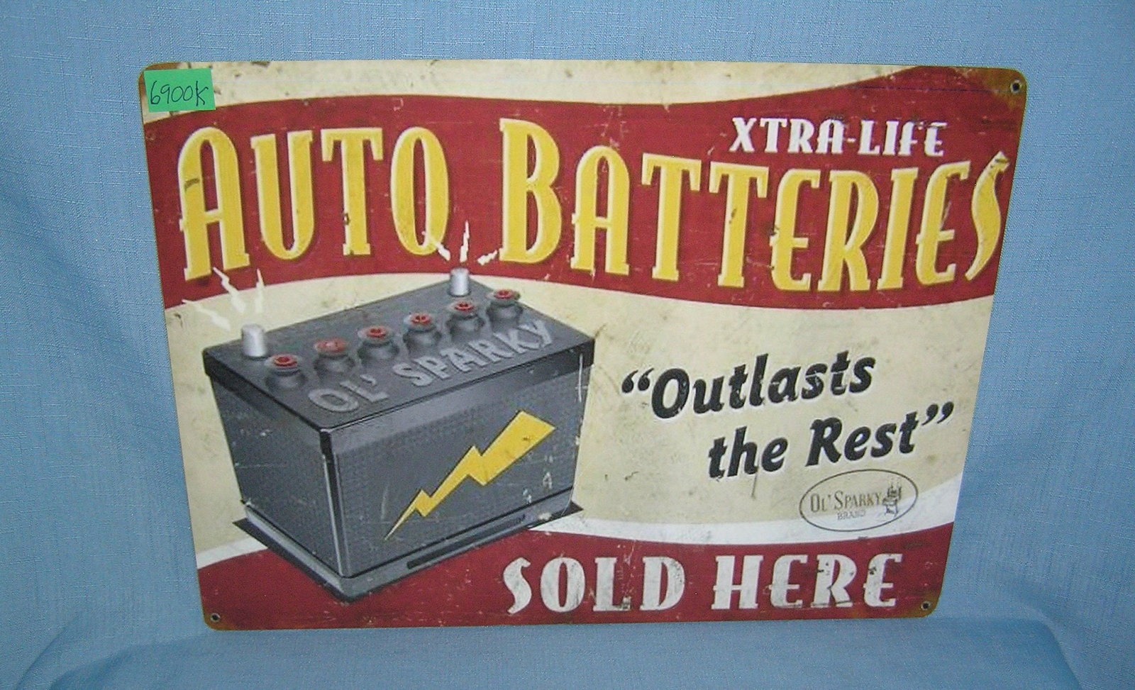Oil Sparky Auto batteries retro retro style advertising sign: Oil Sparky Auto batteries retro retro style advertising sign printed on PVC hardboard these signs are auctioned for their decorative and display purposes 12 inches by 16 inches est. value $50.00-$60.0