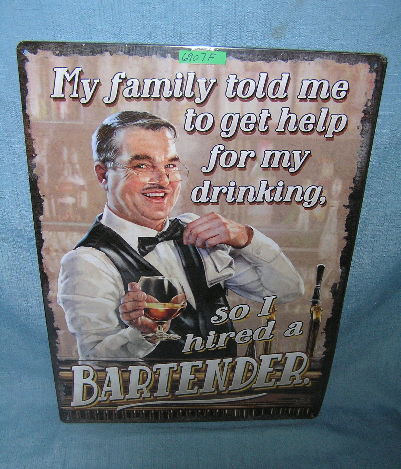 My Family told me to get help for my drinking so I hired a Bartender all tin advertising sign: My Family told me to get help for my drinking so I hired a Bartender all tin advertising sign est. value $40.00-$45.00