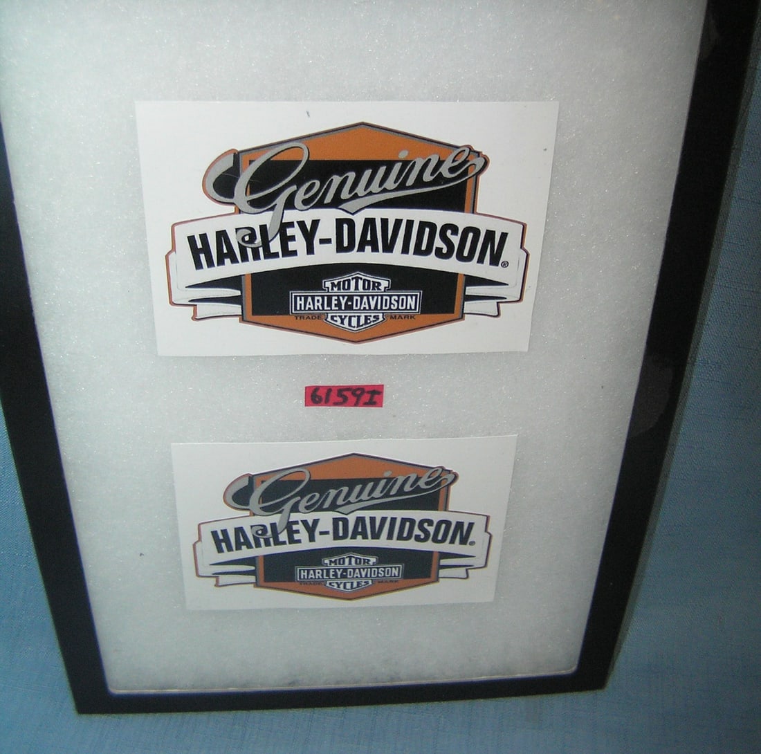 Pair of Harley Davidson advertising stickers: Pair of Harley Davidson 3 1/2 inches by 4 1/2 inches stickers advertising promotional stickers est. value $15.00-$20.00