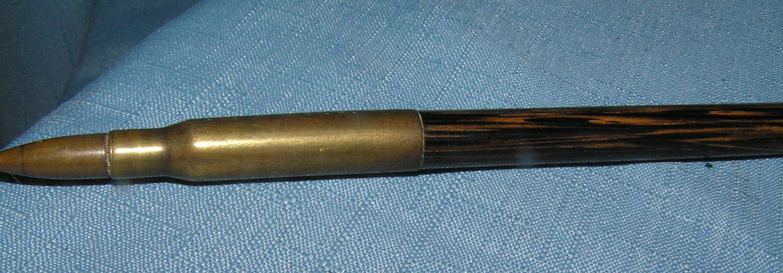 WWII military made officer's trench art pointer: WWII military Trench Art officer's pointer, walnut with brass shell casings est. value $175.00-$200.00