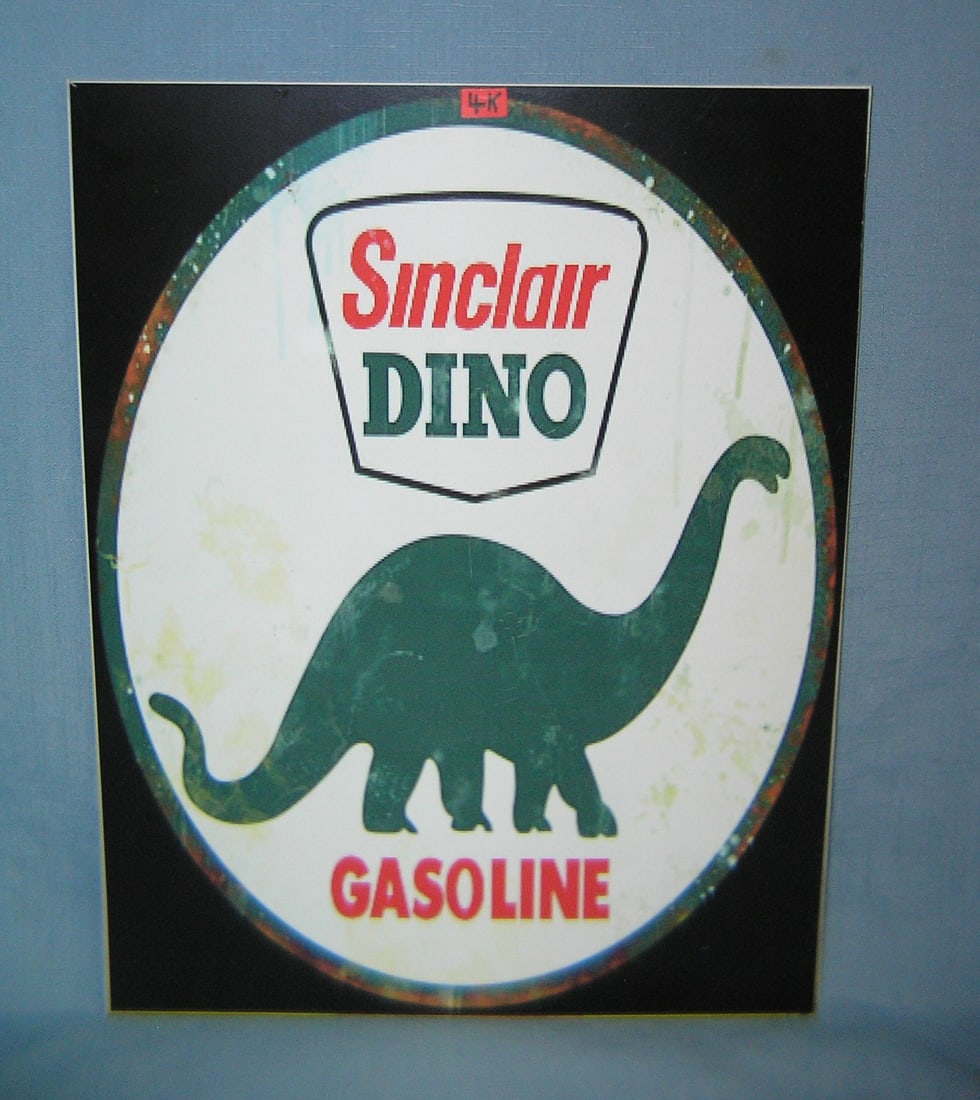 Sinclair Dino Gasoline retro style advertising sign: Sinclair Dino Gasoline retro style advertising sign printed on PVC hard board these signs are auctioned for there decorative and display purposes 12 inches by 16 inches est. value $50.00-$60.00