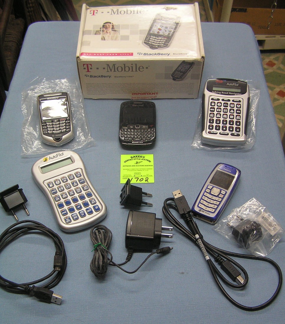 A Group Of Three Electronic Devices A Group Of Three Electronic Devices