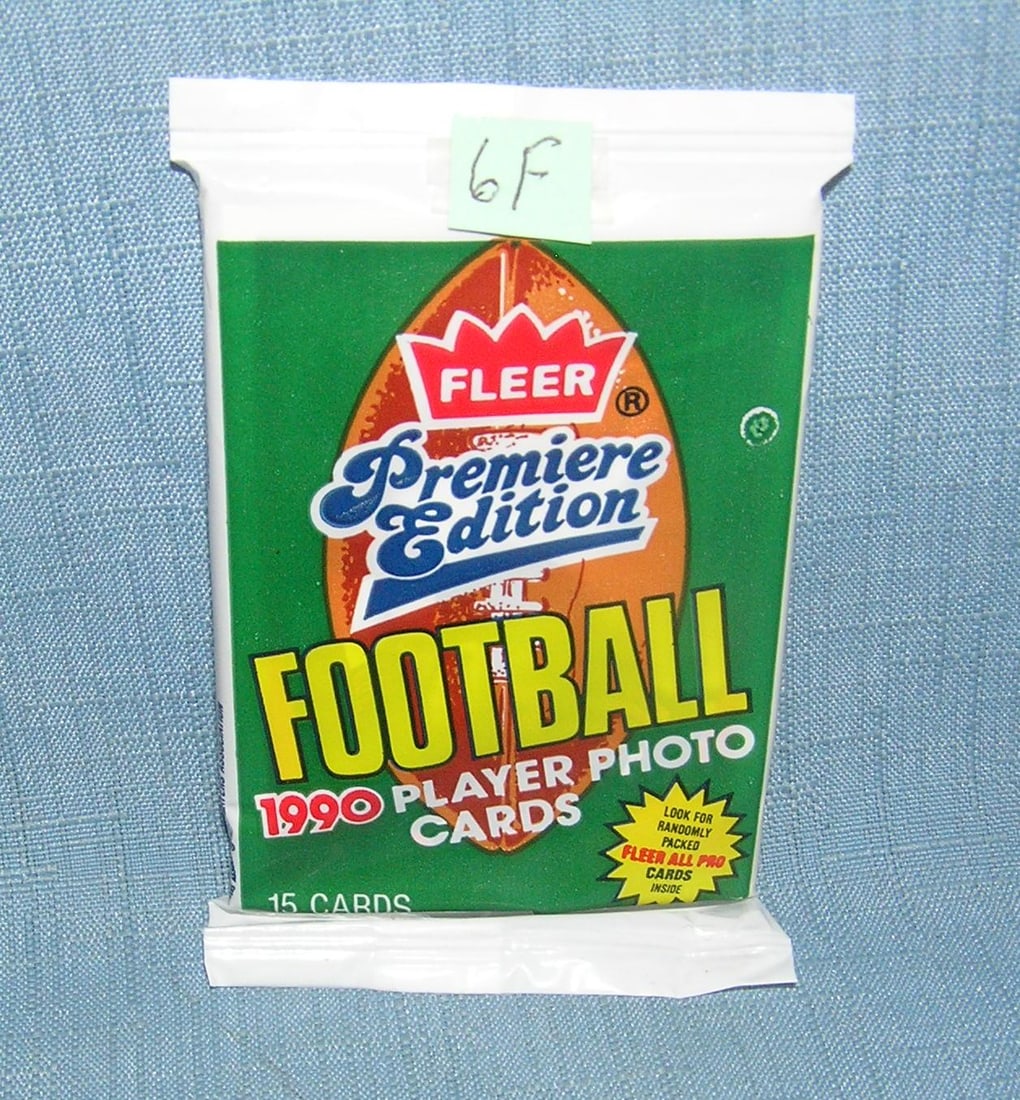 1990 Fleer factory sealed football pack: 1990 Fleer factory sealed football pack Emmitt Smith, Junior Seau, Shannon Sharpe, rookie years plus many more est. value $15.00-$25.00
