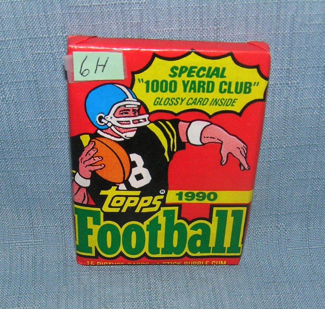 1990 Topps football wax pack: 1990 Topps football wax pack Emmitt Smith, Junior Seau, Shannon Sharpe, rookie years plus many more est. value $15.00-$25.00