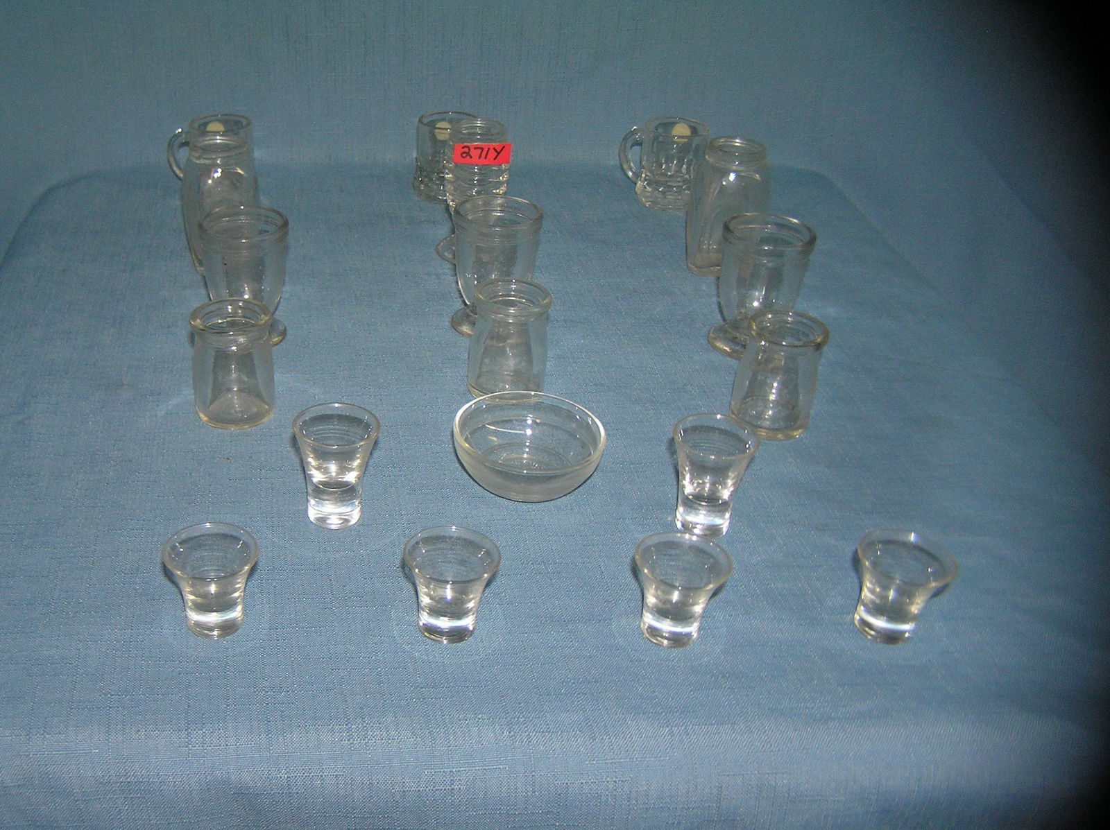 19 piece all glass high quality miniature set: 19 piece all glass high quality miniature set includes drink glasses, Duralaex of France, Pyrex style serving bowl, dessert cups, shakers, shot glasses and more est. value $100.00-$125.00