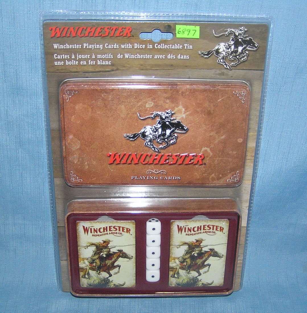 Winchester advertising playing cards and dice set: Winchester advertising playing cards and dice set in collectible tin mint in package est. value $45.00-$50.00