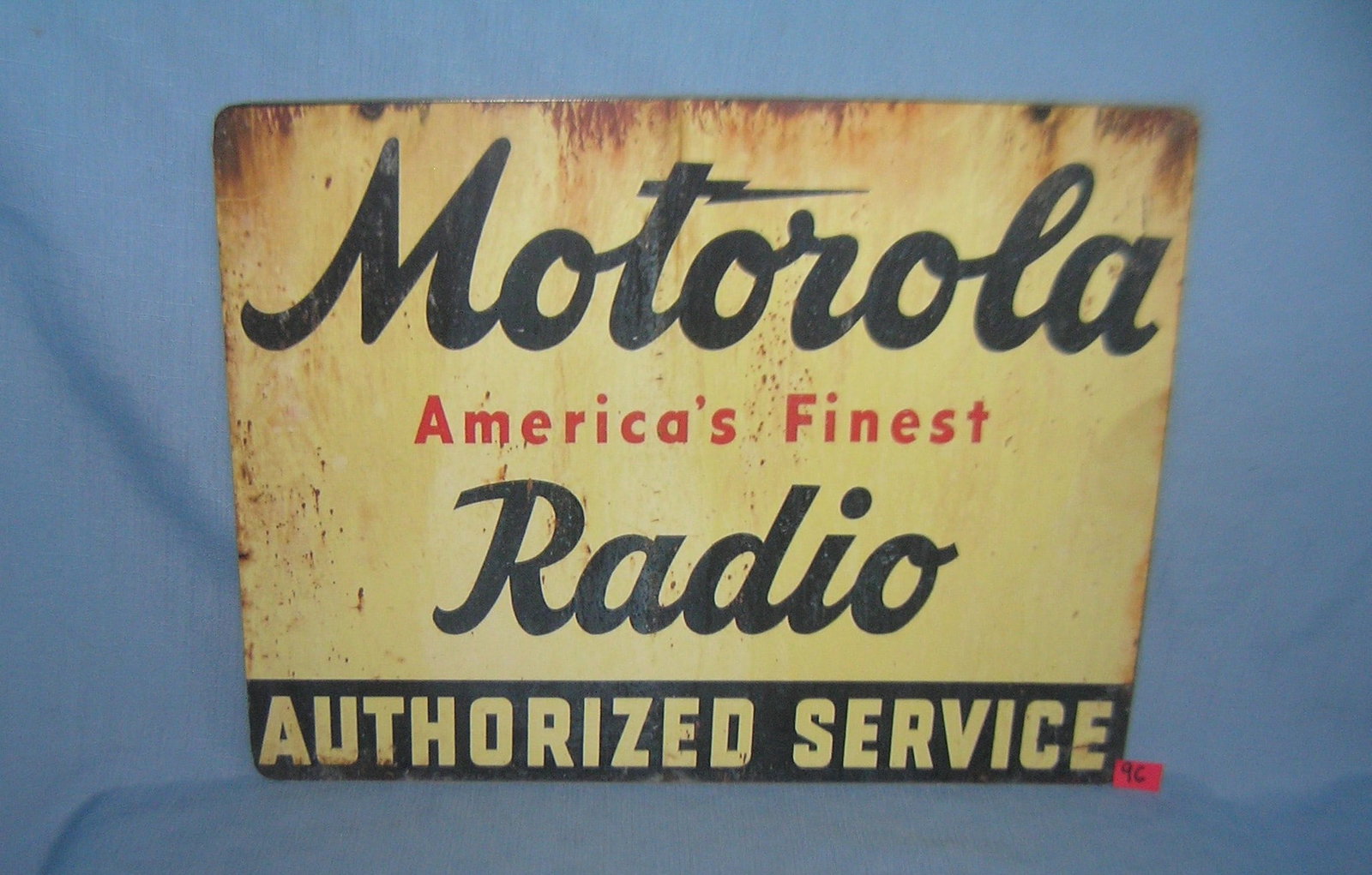 Motorola America's finast radio retro style sign: Motorola America's finast radio authorized dealer 12 by 16 inches retro style advertising sign printed on PVC hard board these signs are auctioned for there decorative and display purposes est. value 