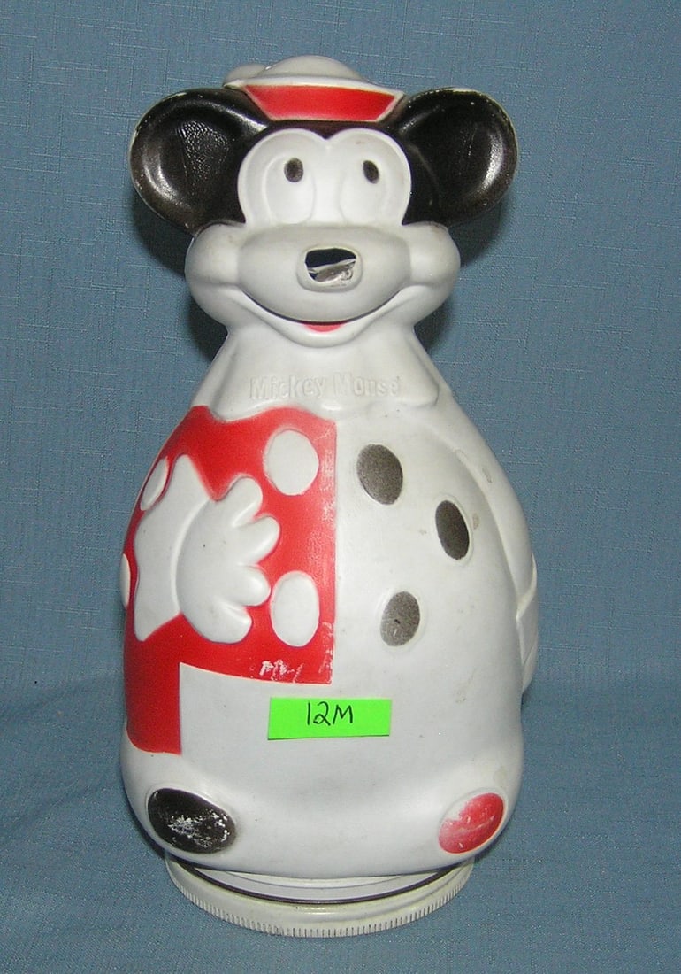 Mickey Mouse Wheat Puffs cereal container bank: Mickey Mouse Wheat Puffs cereal container bank with coin slot mint and uncut dated 1966 est. value $80.00-$100.00