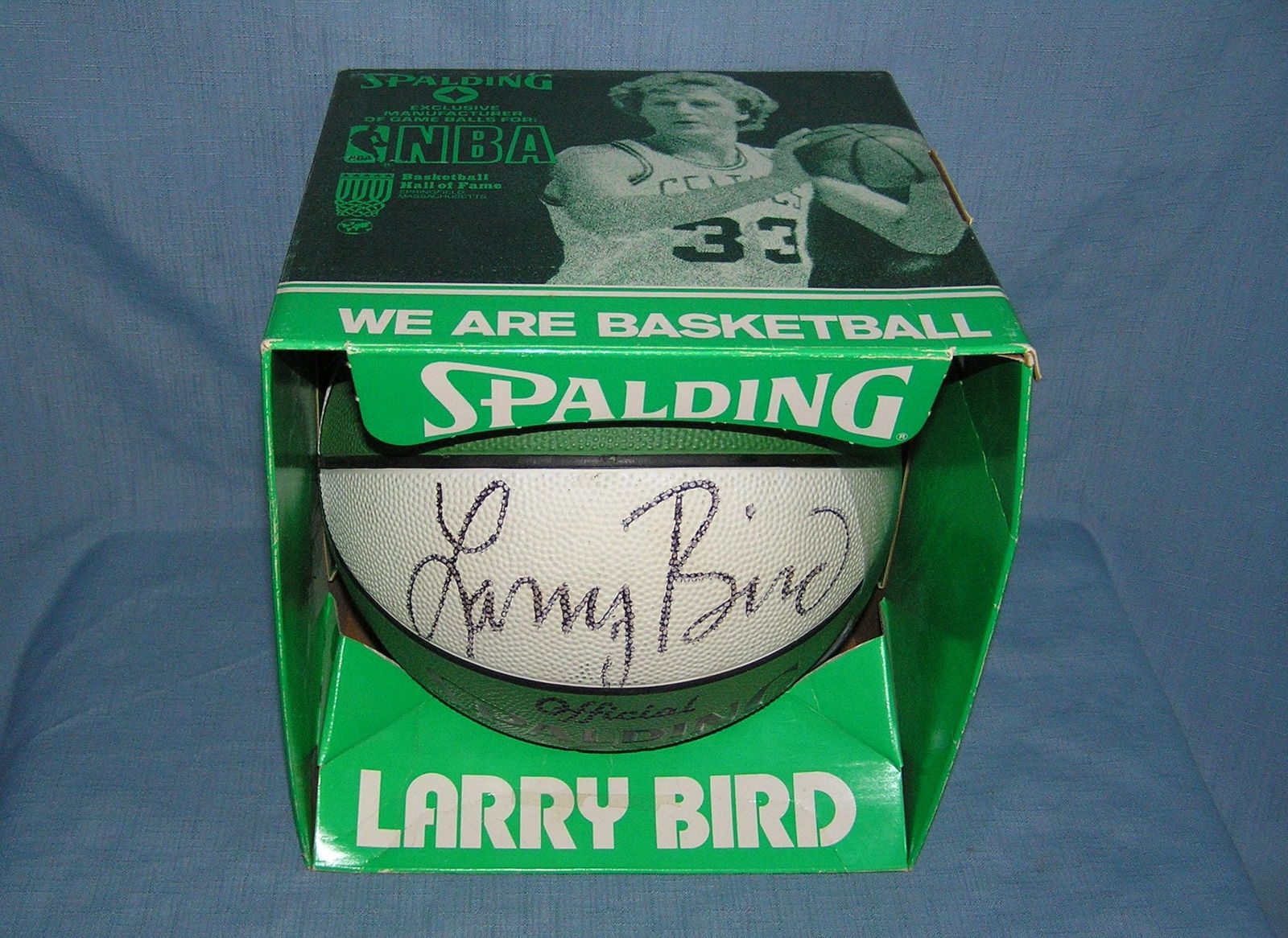 Autographed Larry Bird basketball with original box by Spalding: Autographed Larry Bird basketball with original box by Spalding est. value $800.00-$900.00