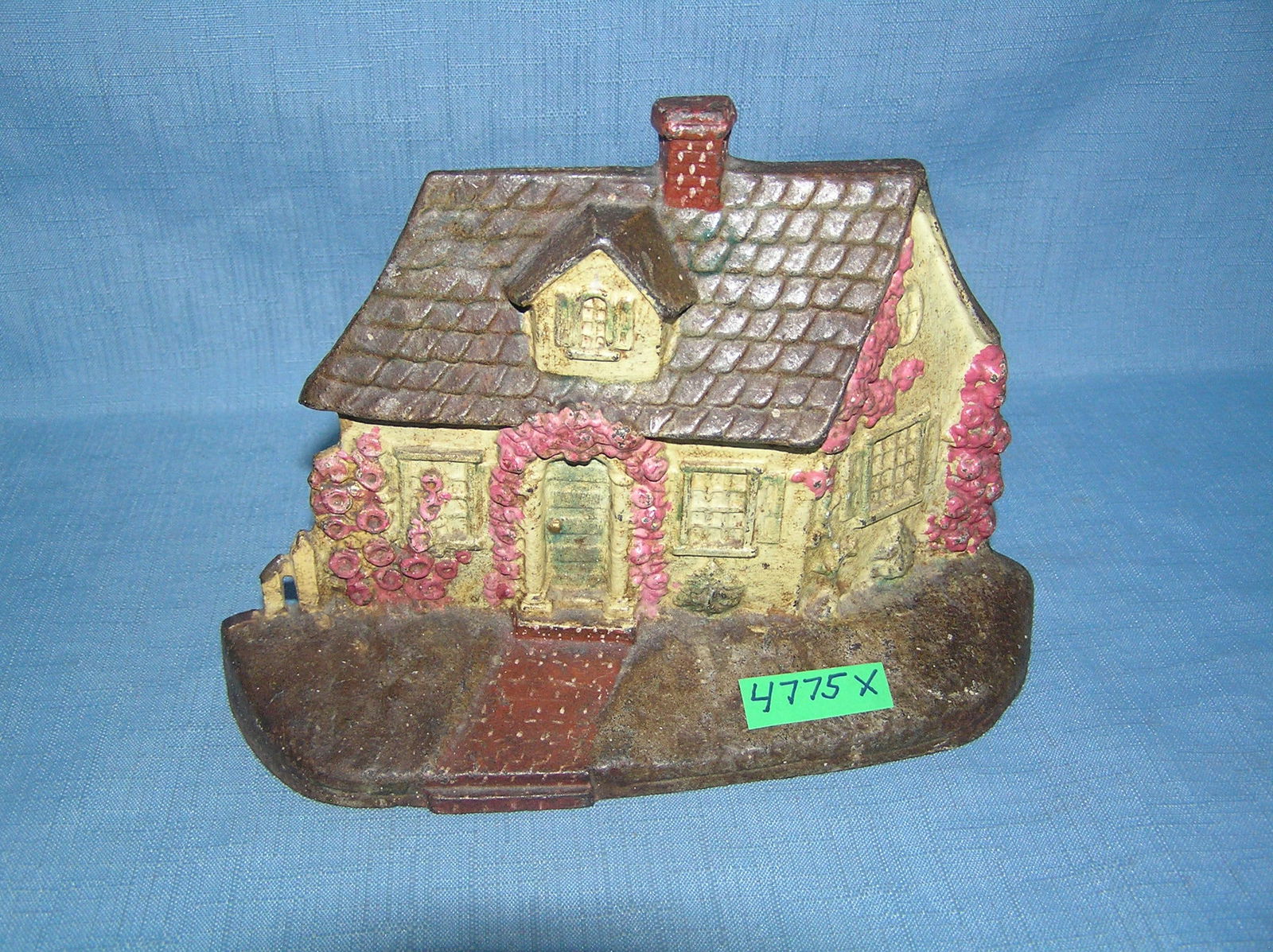 Hand painted cottege house cast iron doorstop: Hand painted cottege house cast iron doorstop circa 1930s est. value $350.00-$375.00