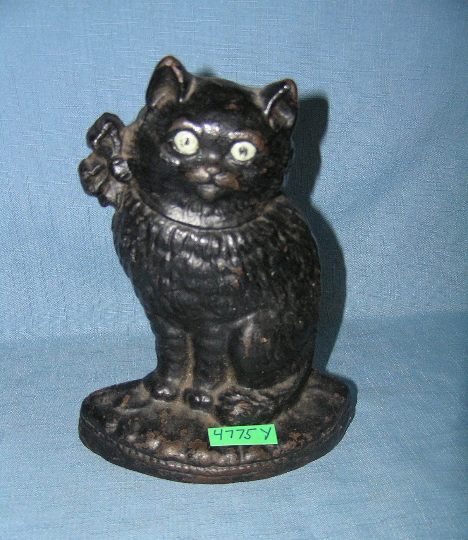 Cast iron seated cat door stop circa 1930s: Cast iron seated cat door stop circa 1930s est. value $350.00-$375.00
