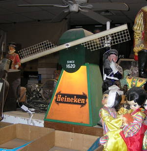 Heineken early illuminated and mech wind mill advertising store display piece this great early: Heineken early illuminated and mech wind mill advertising store display piece this great early advertising piece is in excellent working condition est. value $600.00-$700.00