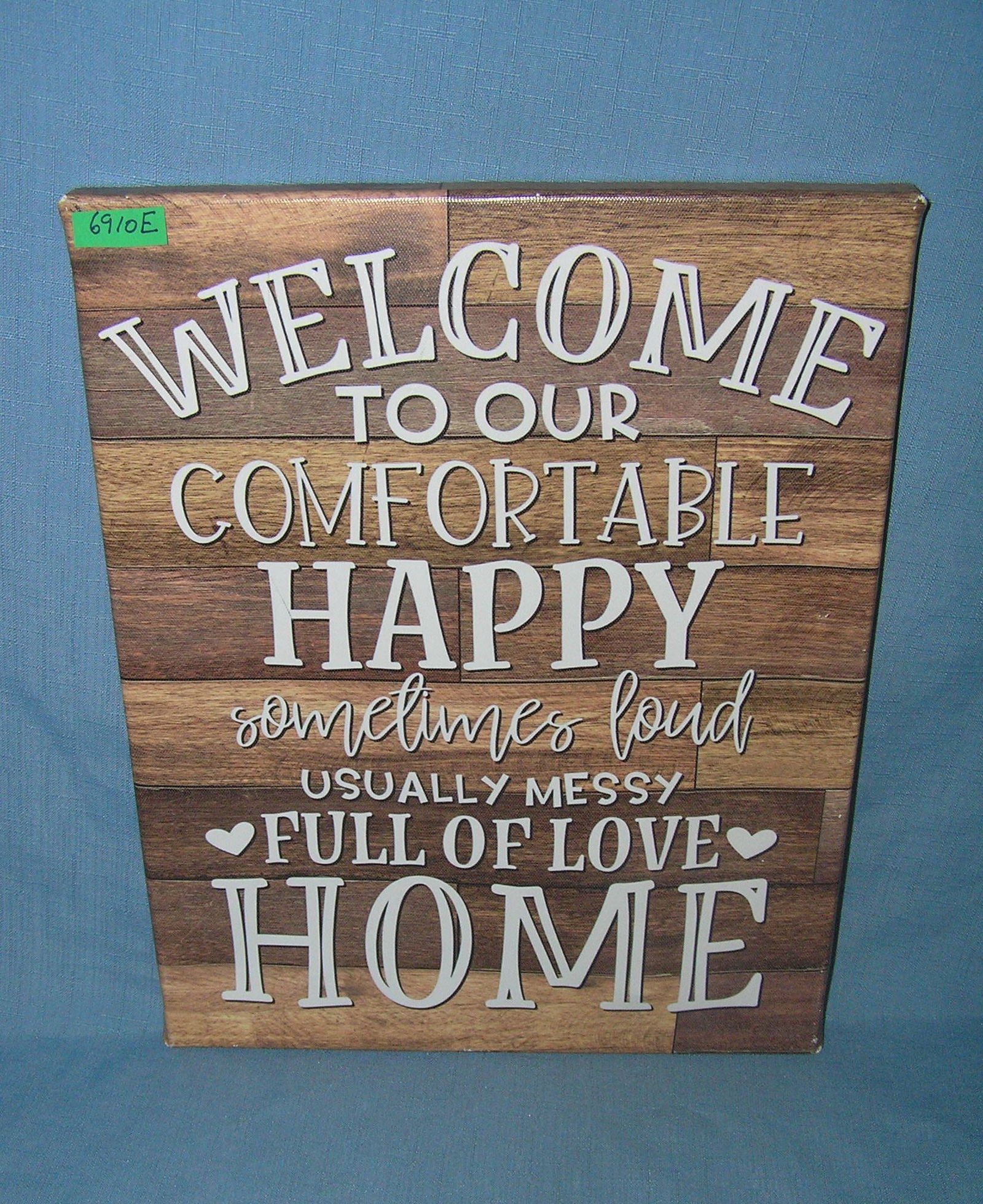 Welcome to our comfortable and happy home sign (1 of 1)