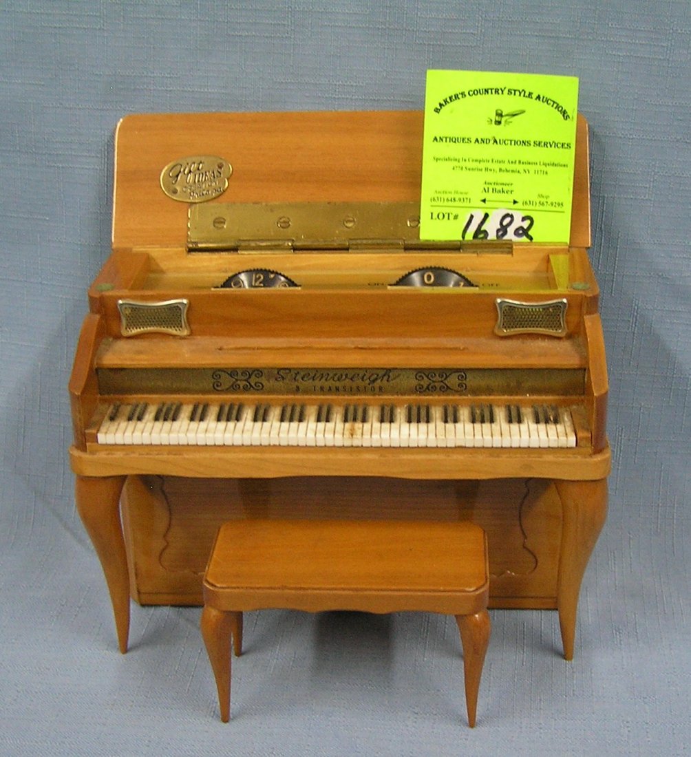 Vintage high quality Steinway piano shaped transistor: Vintage high quality Steinway piano shaped transistor radio with miniature piano bench circa 1950’s est. value $150.00-$200.00