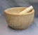 Antique earthenware mortar and pestle