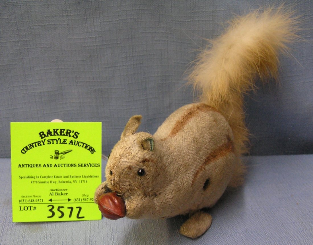 Antique fur covered tin windup mechanical squirrel toy: Antique fur covered tin windup mechanical squirrel toy $100.00-$125.00