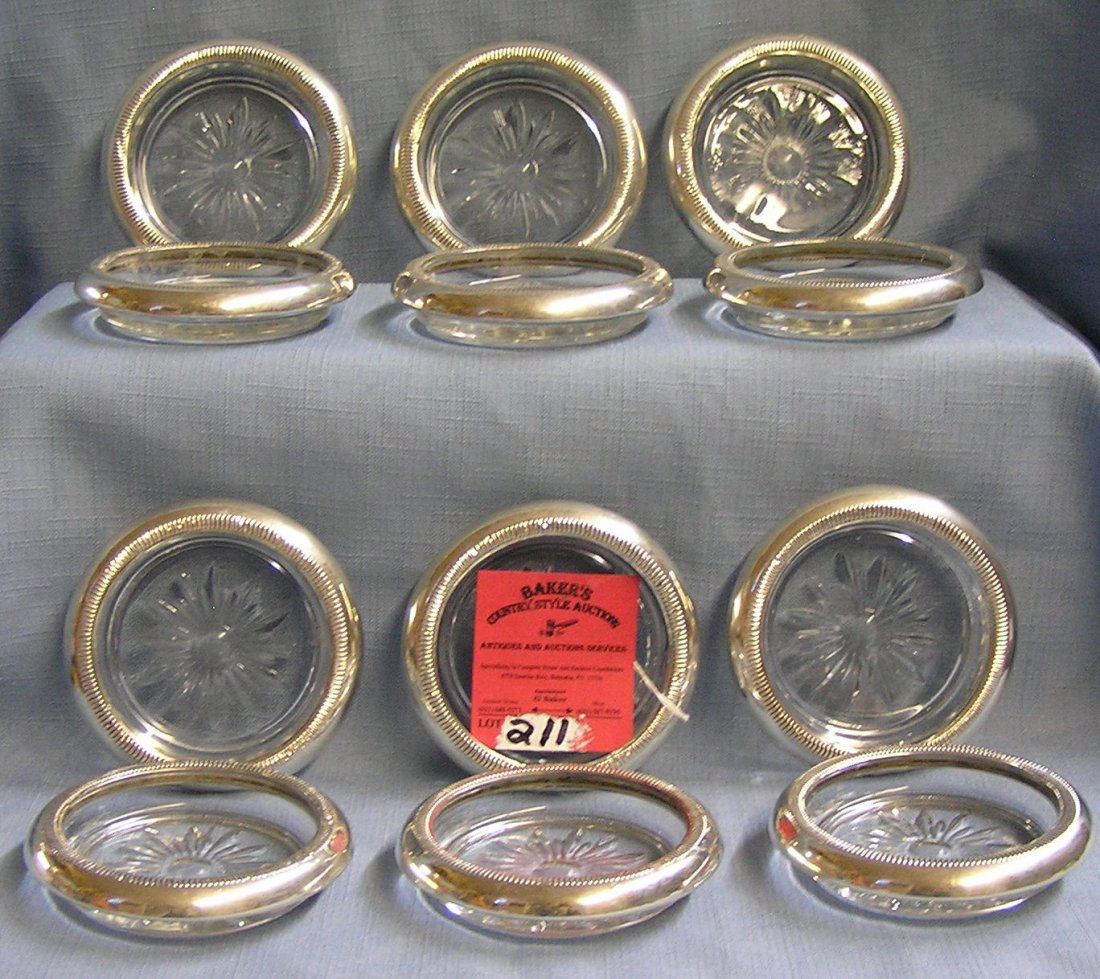 Set of 12 sterling silver and crystal coasters: Set of 12 sterling silver and crystal coasters est. value $125.00-$150.00