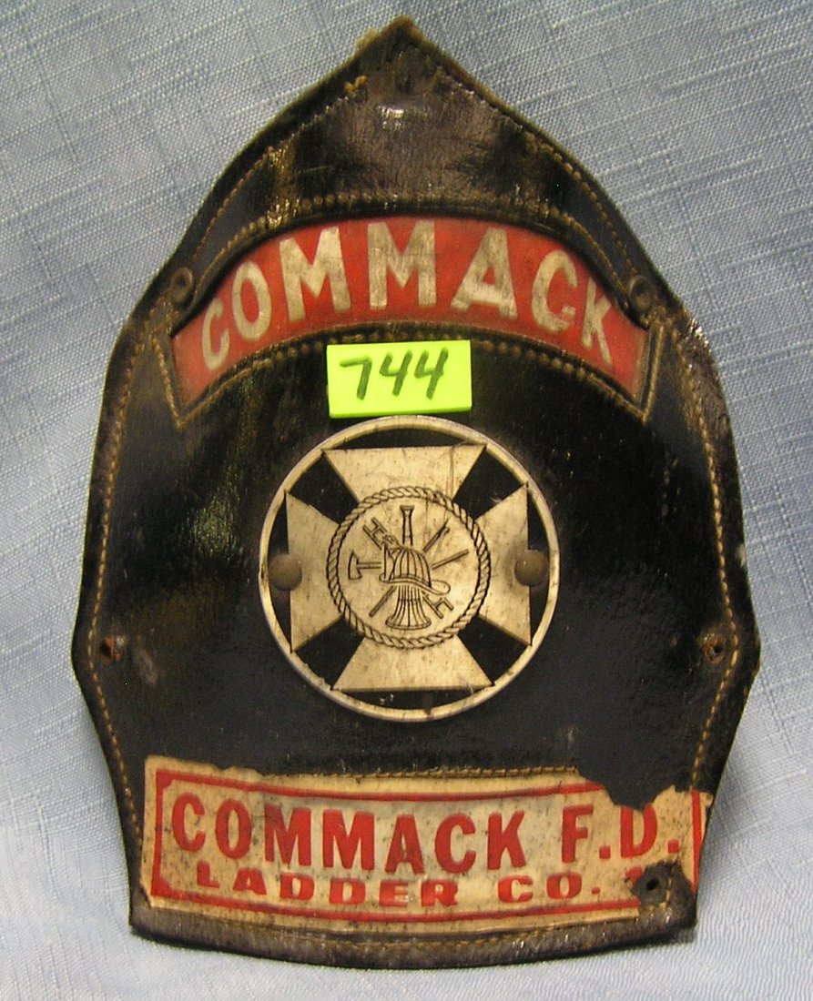 Antique fire helmet shield: Antique fire helmet shield $40.00-$50.00