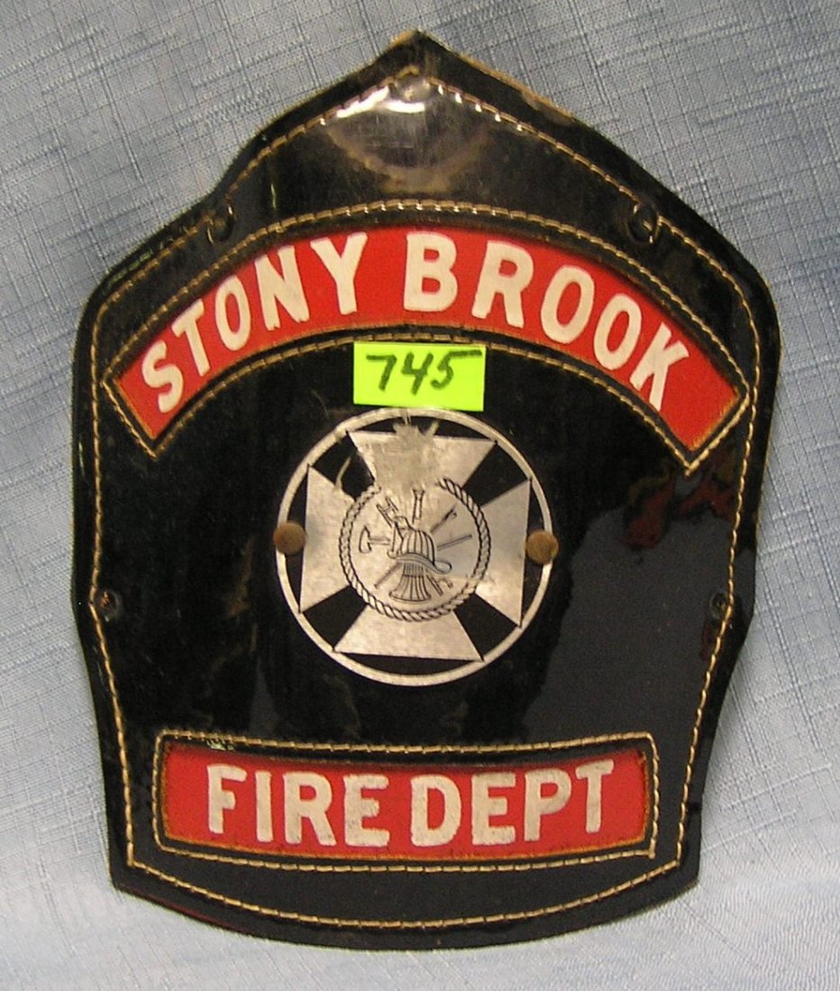 Antique fire helmet shield: Antique fire helmet shield $40.00-$50.00