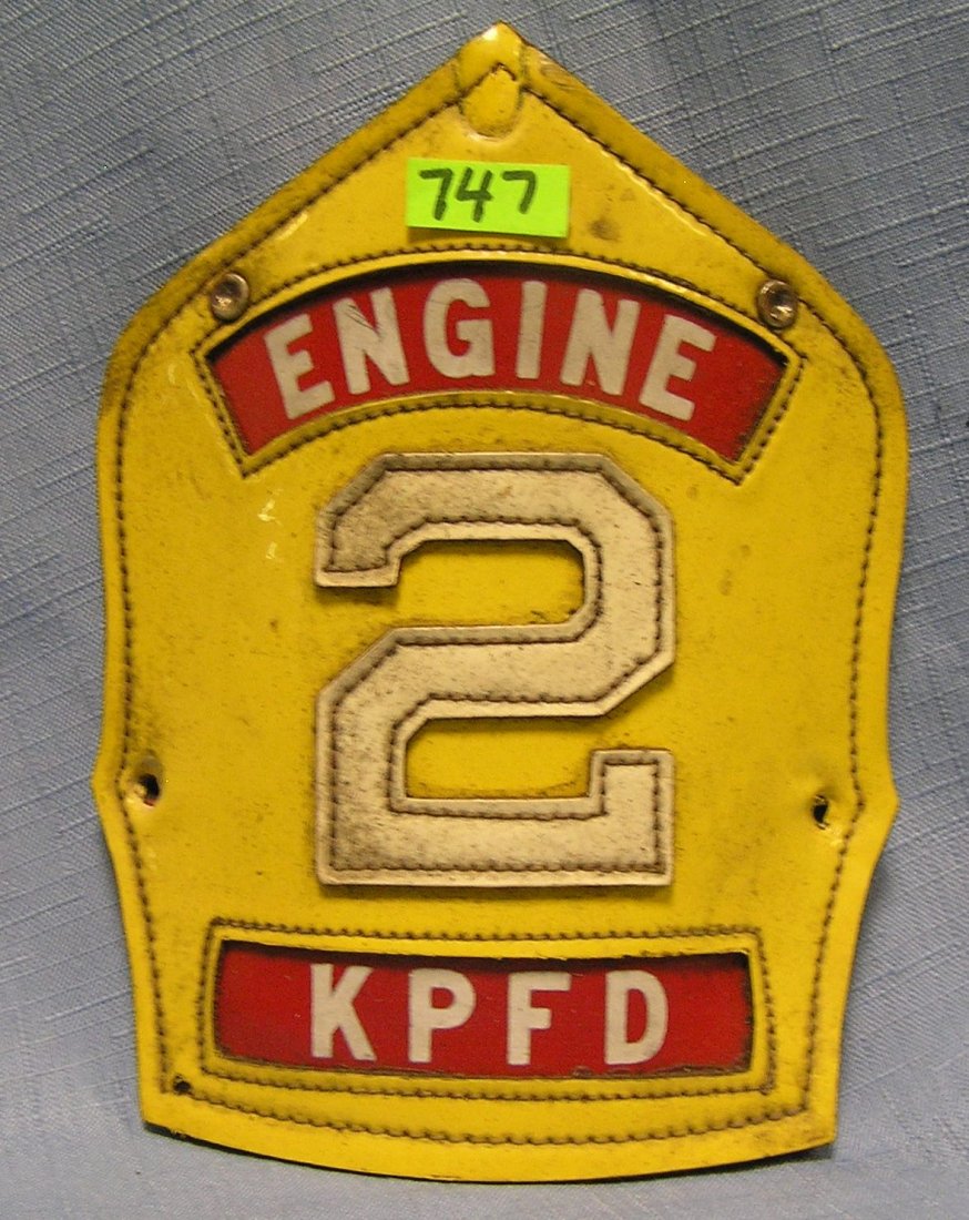 Antique fire helmet shield: Antique fire helmet shield $40.00-$50.00