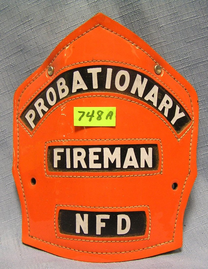 Antique fire helmet shield: Antique fire helmet shield $40.00-$50.00
