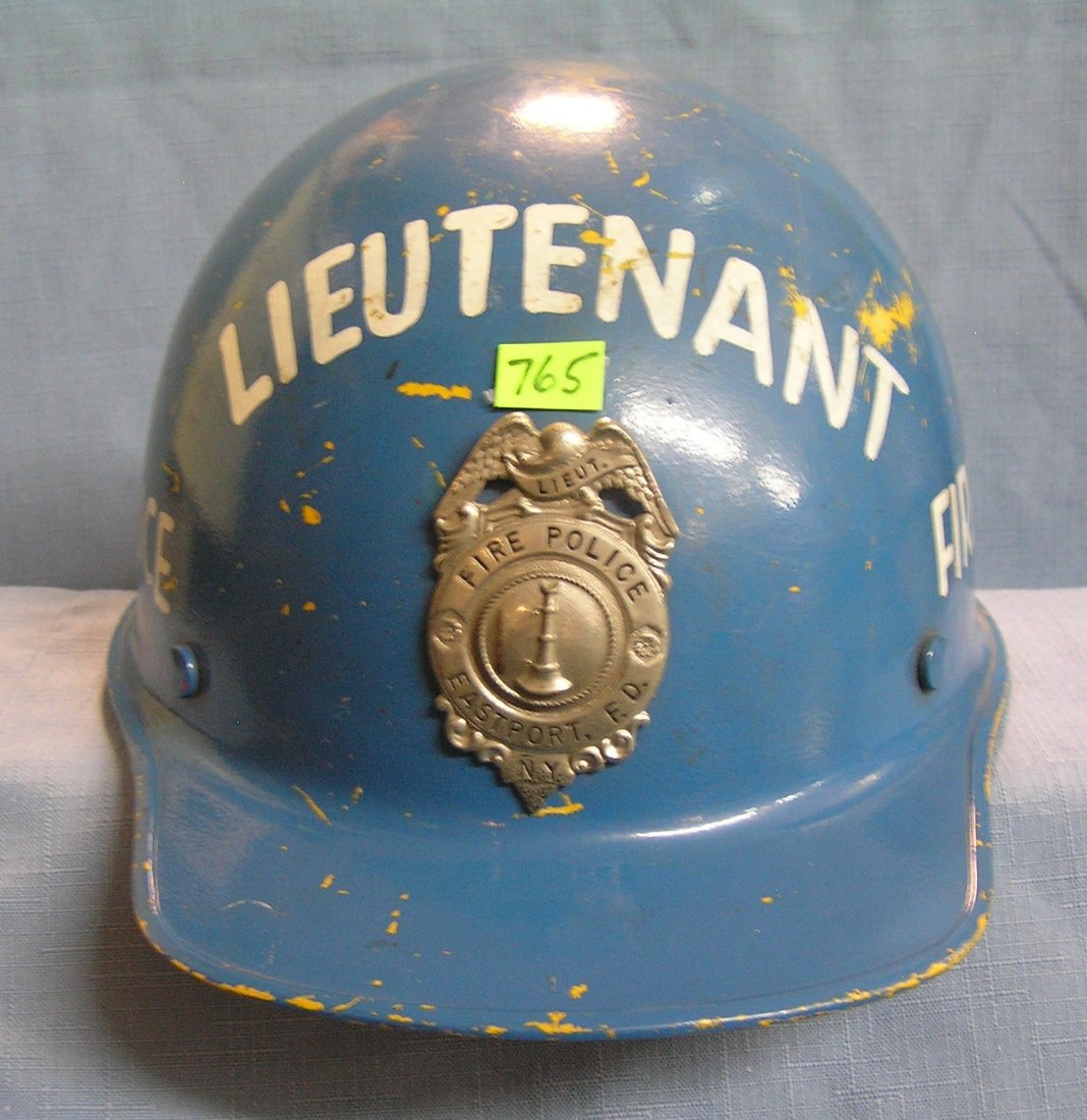 Vintage fire police lieutenant helmet and shield: Vintage fire police lieutenant helmet and shield $100.00-$125.00