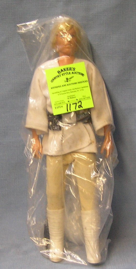 Luke Skywalker Star Wars action figure: Early original 12’’ Luke Skywalker Star Wars action figure with original weapon mint un-played with $150.00-$200.00