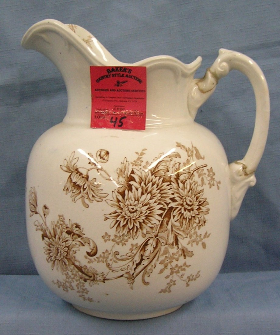 Antique fall decorated water pitcher: Antique fall decorated water pitcher by Buffalo pottery circa 1940’s handle as found repaired est. value $40.00-$50.00