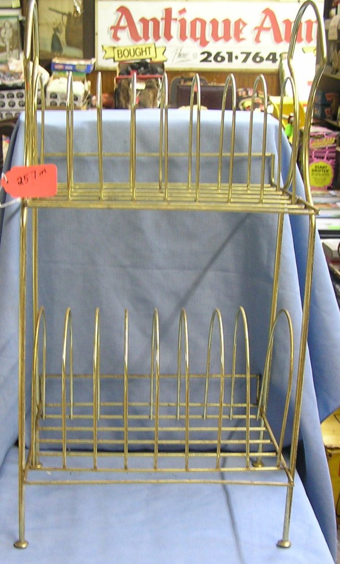 Vintage all metal record rack: Vintage all metal record rack circa 1950's est. value $25.00-$35.00