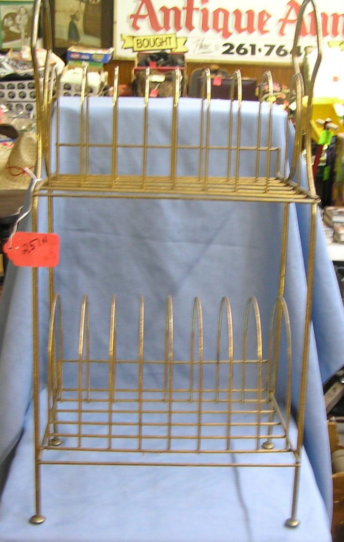 Vintage all metal record rack: Vintage all metal record rack circa 1950's est. value $25.00-$35.00