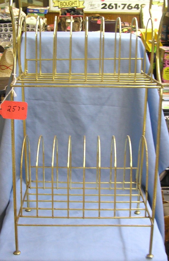 Vintage all metal record rack: Vintage all metal record rack circa 1950's est. value $25.00-$35.00