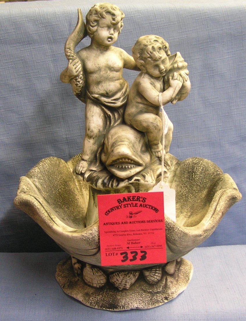 Cherub decorated fountain: Cherub decorated fountain est. value $40.00-$50.00