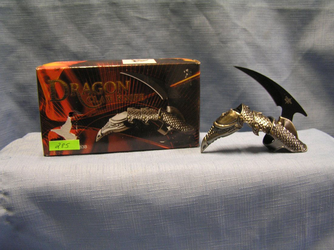 Dragon claw knife: Dragon claw knife mint with original box est. value $30.00-$40.00