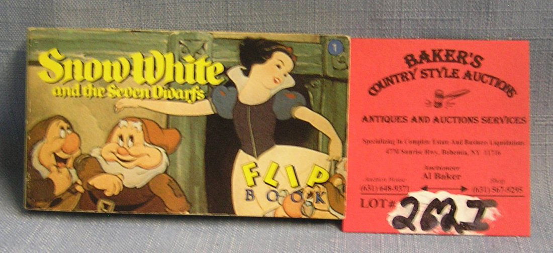 Walt Disney Snow White and the 7 dwarfs flip book: Walt Disney Snow White and the 7 dwarfs flip book est. value $15.00-$25.00
