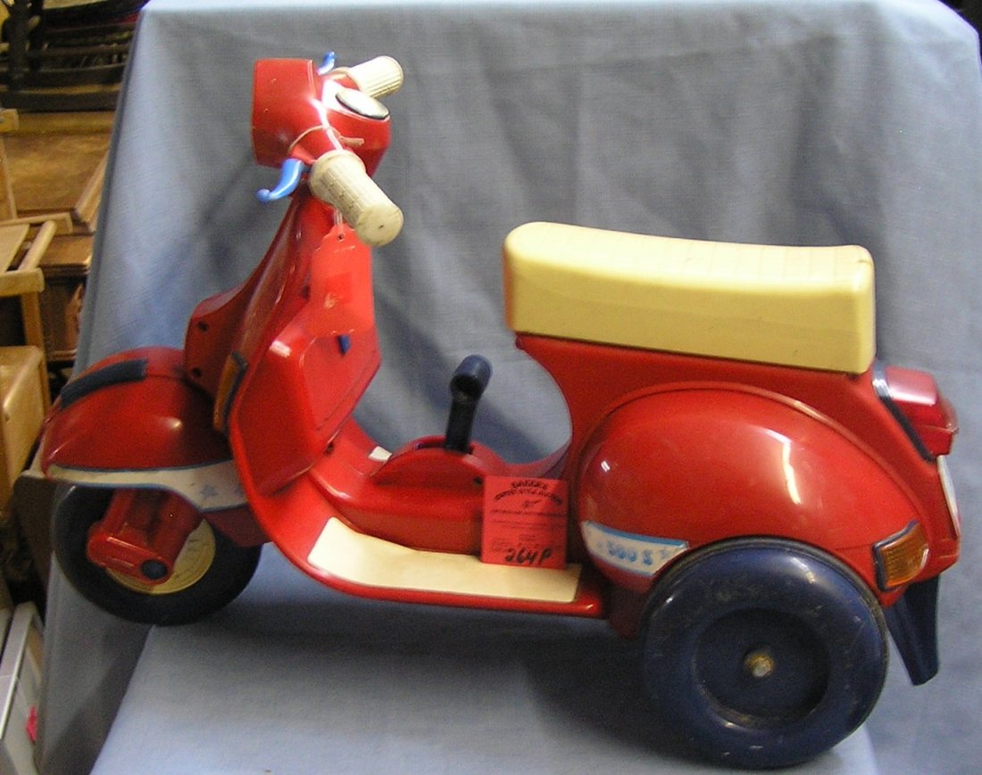 Vintage hard plastic battery driven child's vesper type: Vintage hard plastic battery driven child's vesper type scooter circa 1960's-70's est. value $75.00-$100.00