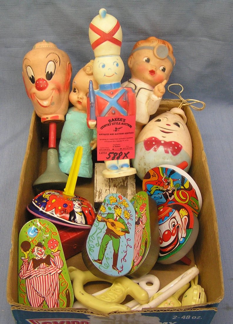 Box of vintage 1950's toys: Box of vintage 1950's toys includes squeeze toys, tin mechanical noise makers and more est. value $50.00-$60.00