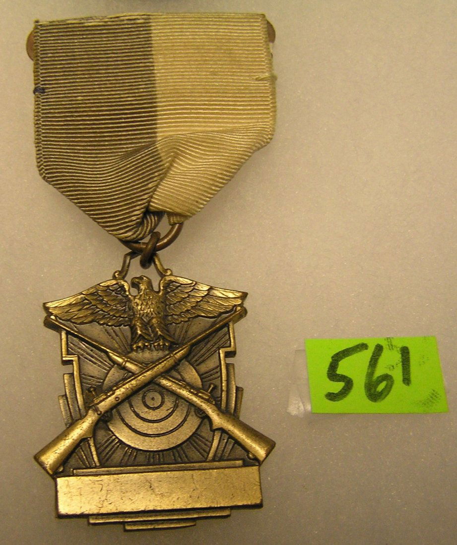 Vintage Marksman medal and ribbon: Vintage Marksman medal and ribbon est. value $50.00-$75.00