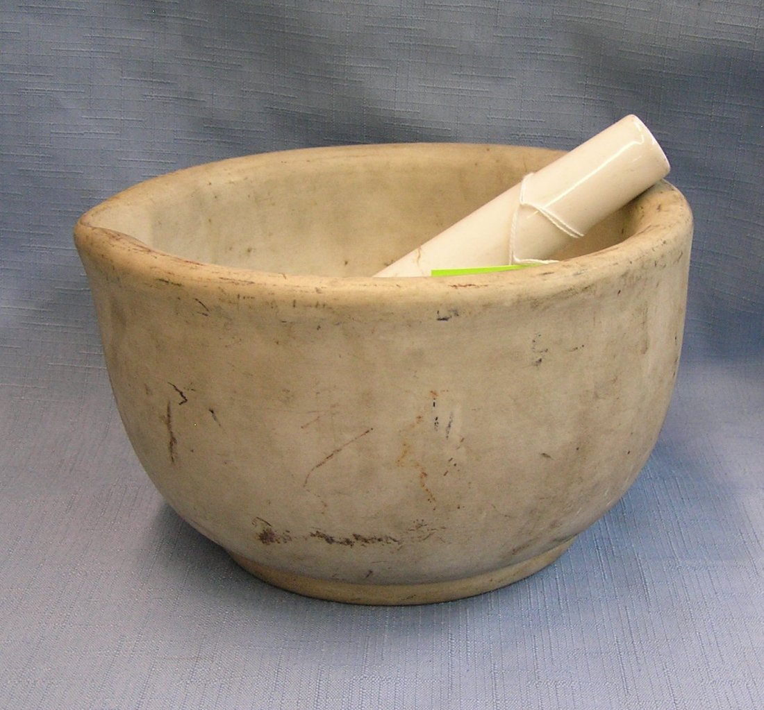 Antique earthenware mortar and pestle: Antique earthenware mortar and pestle est. value $225.00-$275.00