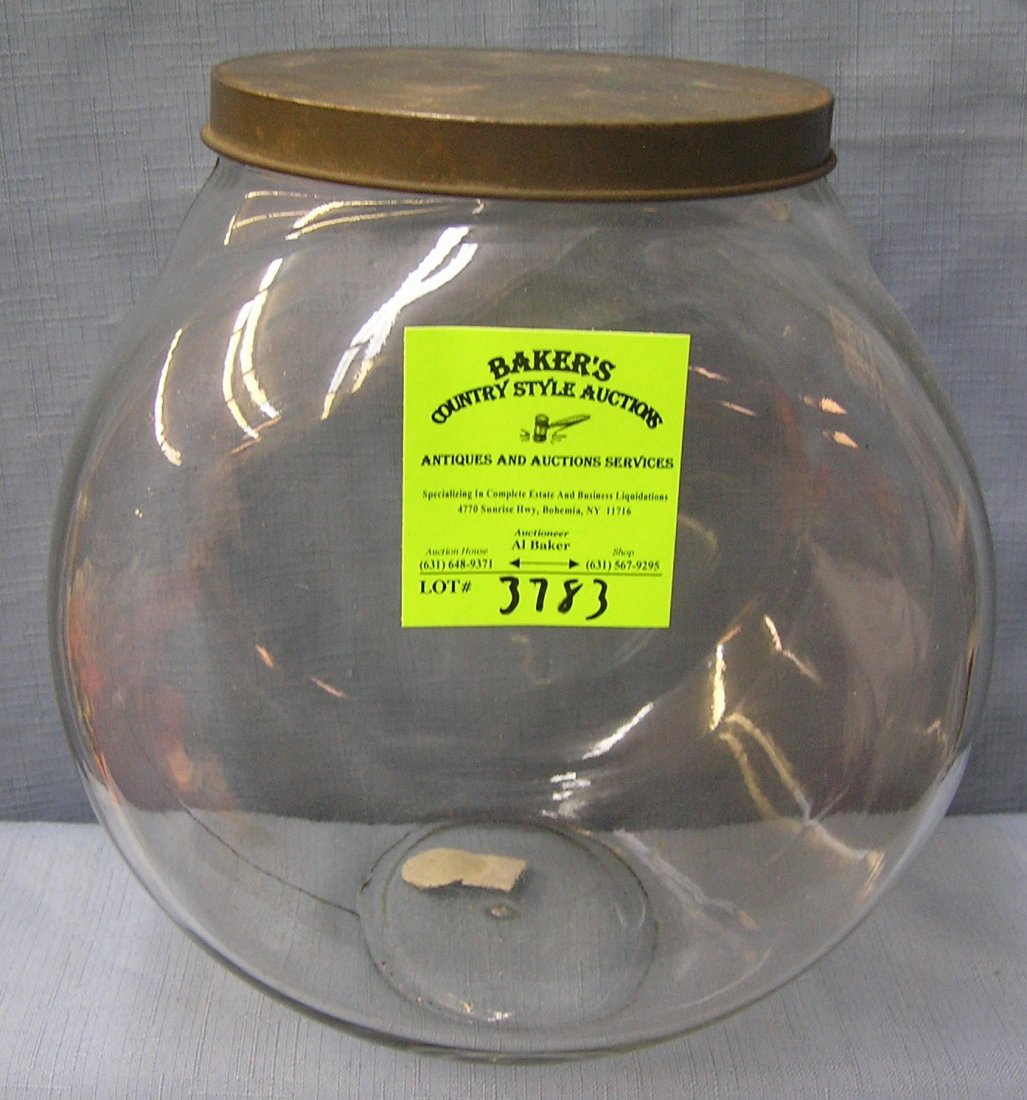 Large antique storage jar with metal cover: Large antique storage jar with metal cover from old country store est. value $35.00-$40.00