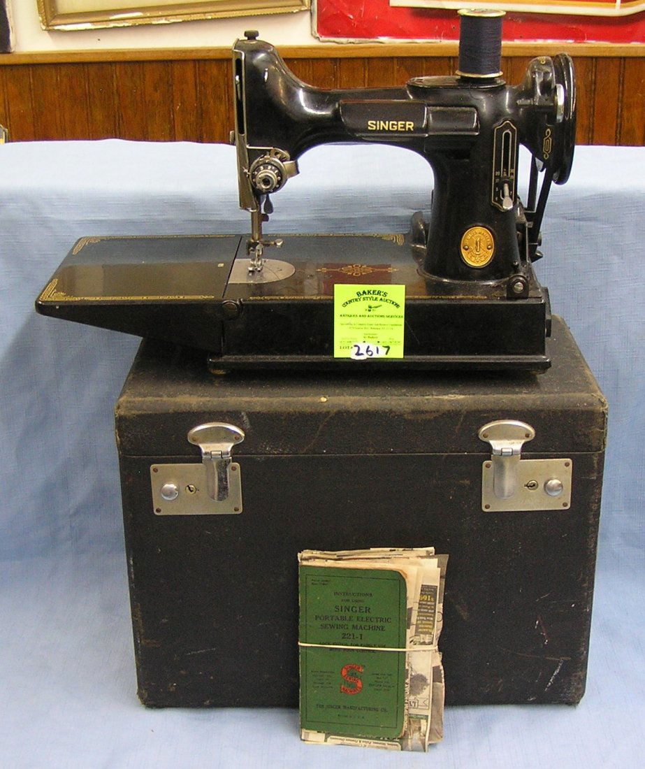 Antique Singer Feather Weight sewing machine with: Antique Singer Feather Weight sewing machine with original box and all accessories including instruction booklet, machine also comes with original accessories tray est. value $500.00-$600.00